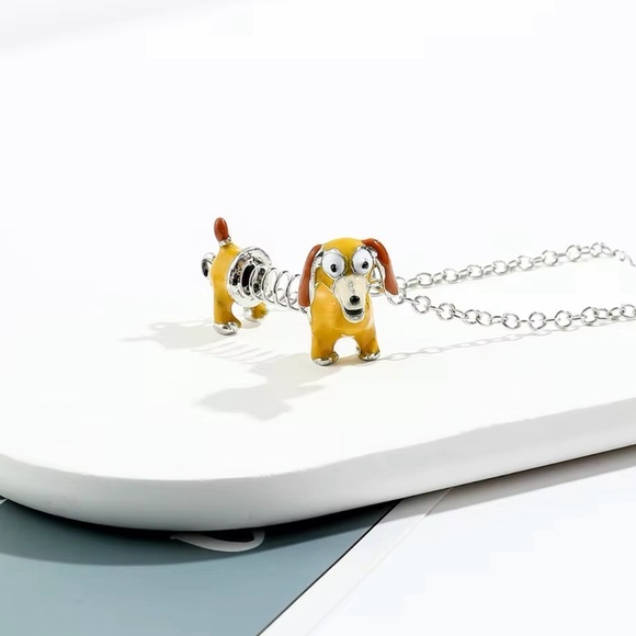 ⭐️NEW⭐️ Toy Story Slinky Dachshund Dog Pendant Necklace - Picture 5 of 8
